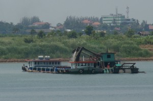 Transporting sand by barges