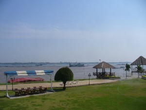 A dredging ship, where the Mekong and the Tonle Sap river meet - with pipes extending to the left